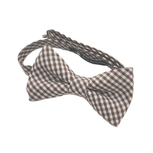 A chocolate brown gingham bow tie on an adjustable neck band.