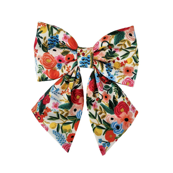 colorful dog sailor bows that attach to the collar for small and large dogs in a colorful floral print