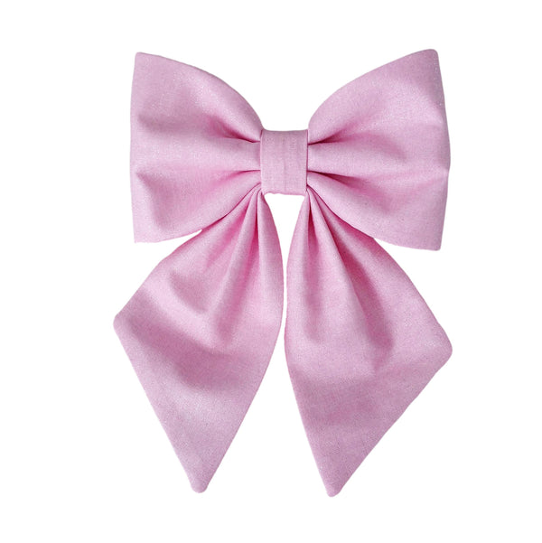 Pink glittery dog sailor bows for small and large dogs that attach to the collar