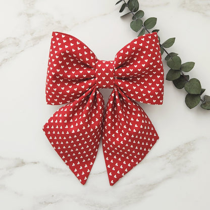 Red sailor bow with tiny white hearts