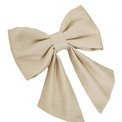 A sparkly creamy pearl dog bow for girls collars.