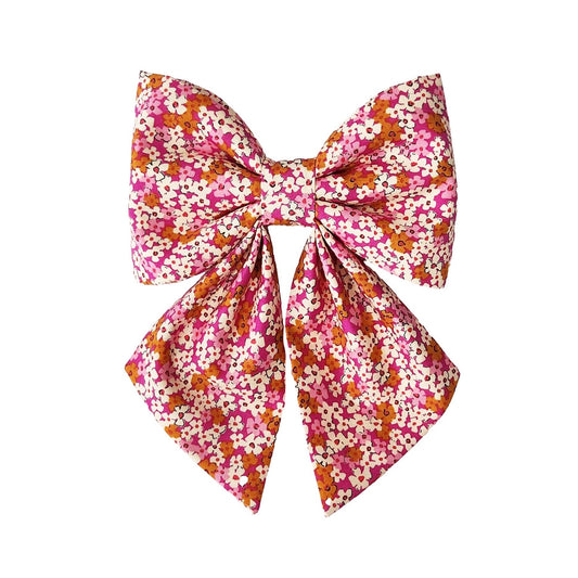 dog collar bows in a pink and orange floral print for large and small dogs 