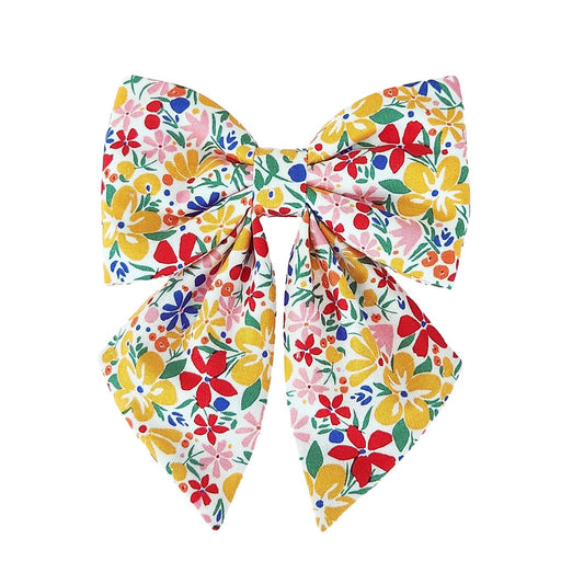 fun dog sailor bows for the collar with yellow red and pink flowers