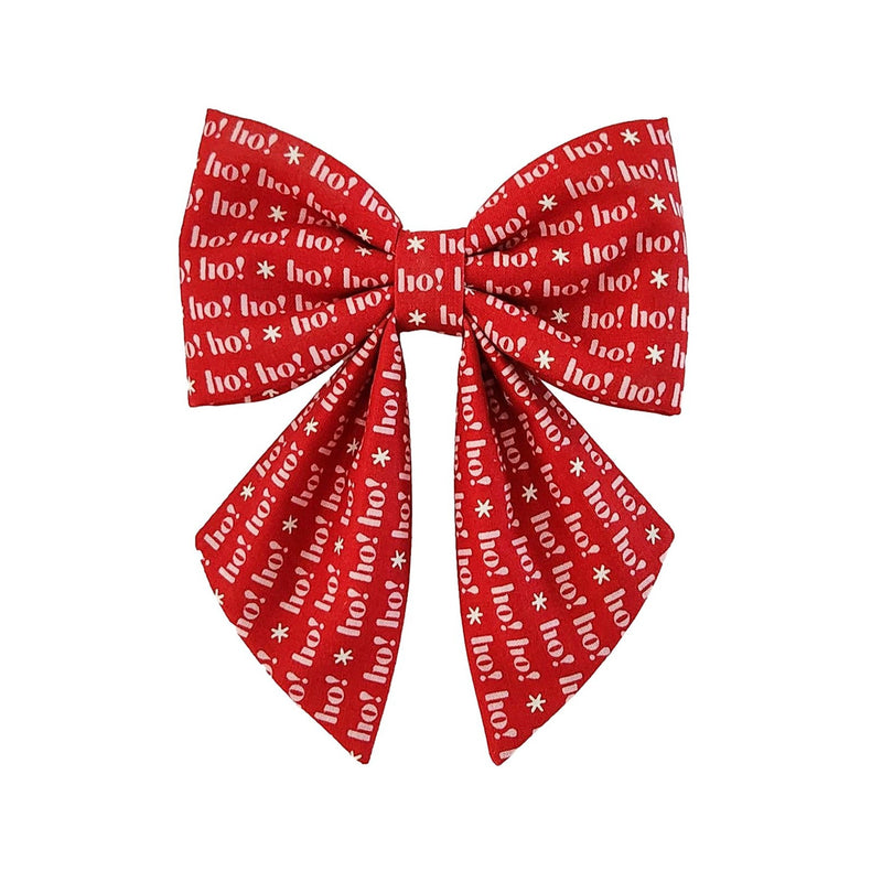 Red dog sailor bows in a ho ho ho print for small and large dogs that attach to the collar