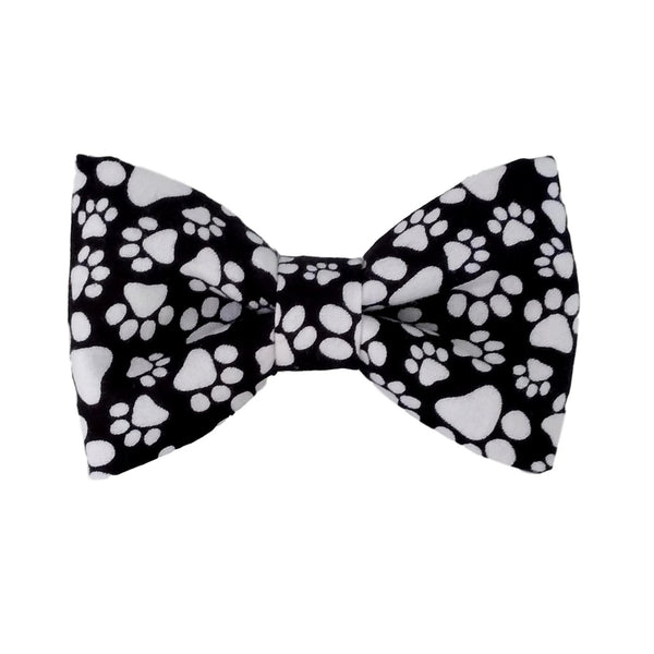 black dog bow tie with white paw print for the collar