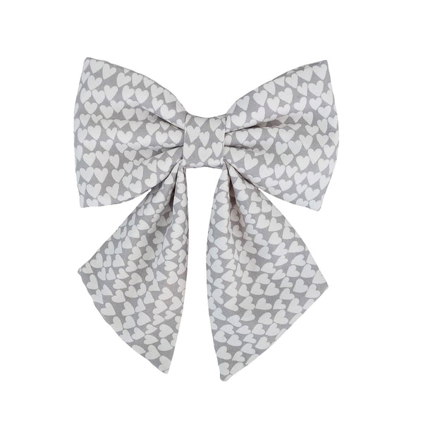 gray sailor dog bows with white hearts that attach to the dog collar for small medium and large dogs