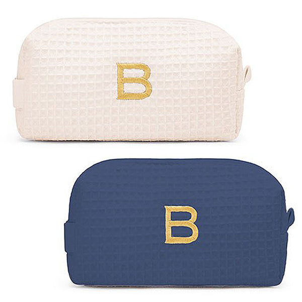 waffle cosmetic bags in navy and ivory